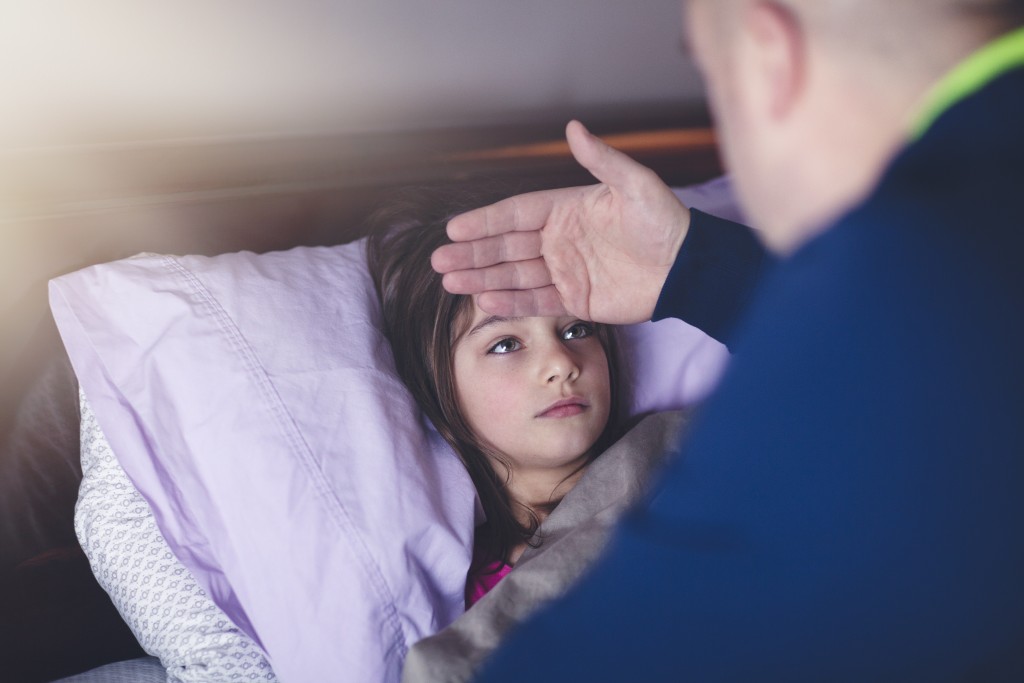 Image of a sick child and parent
